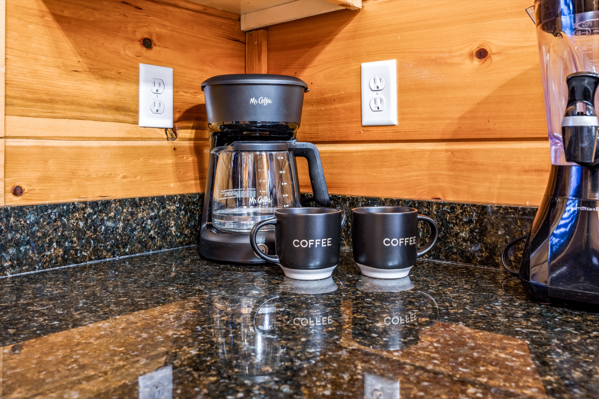 Coffee station in the Bearadise kitchen with a drip coffee maker and two mugs