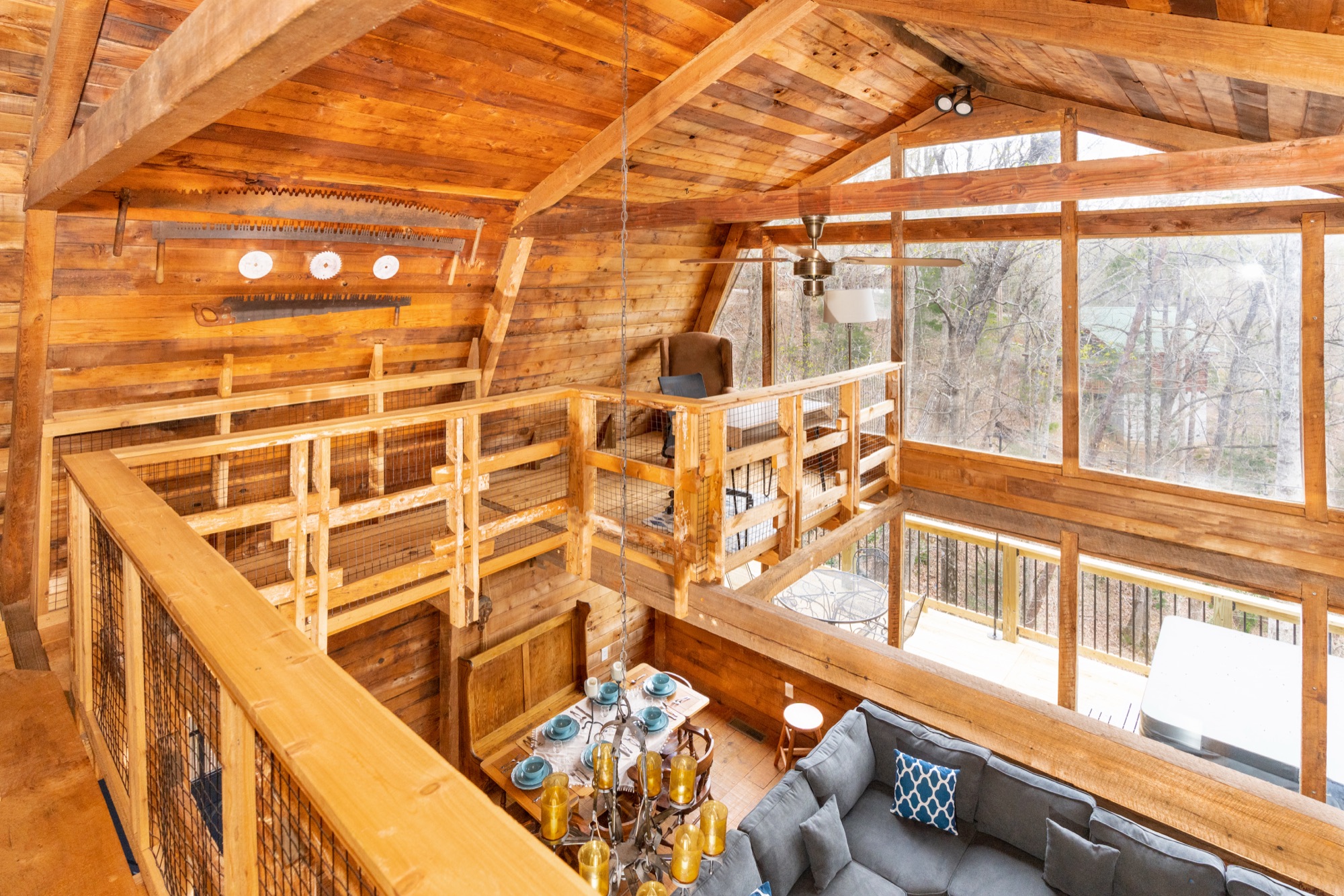 Loft nook at Rustic Retreat with tool storage and a small desk